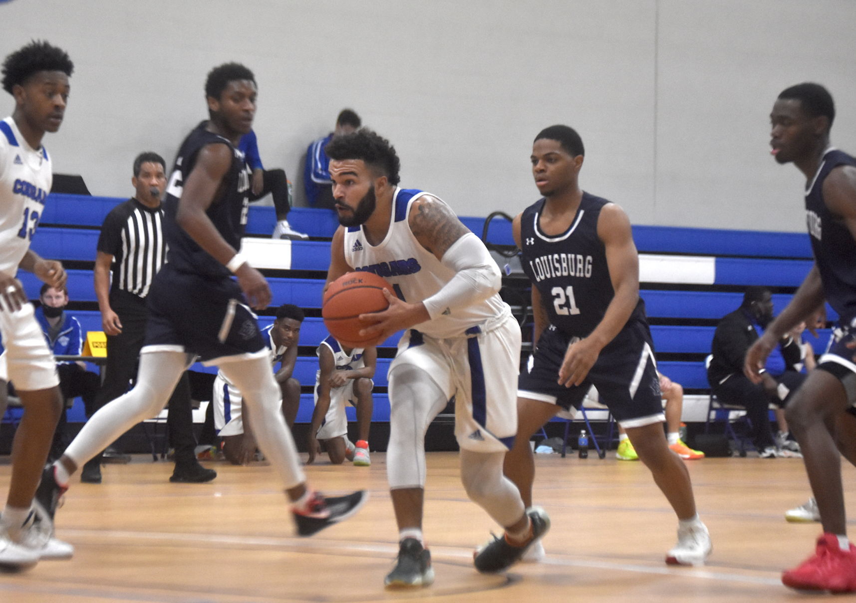 Louisburg outruns Cougars, 98-83